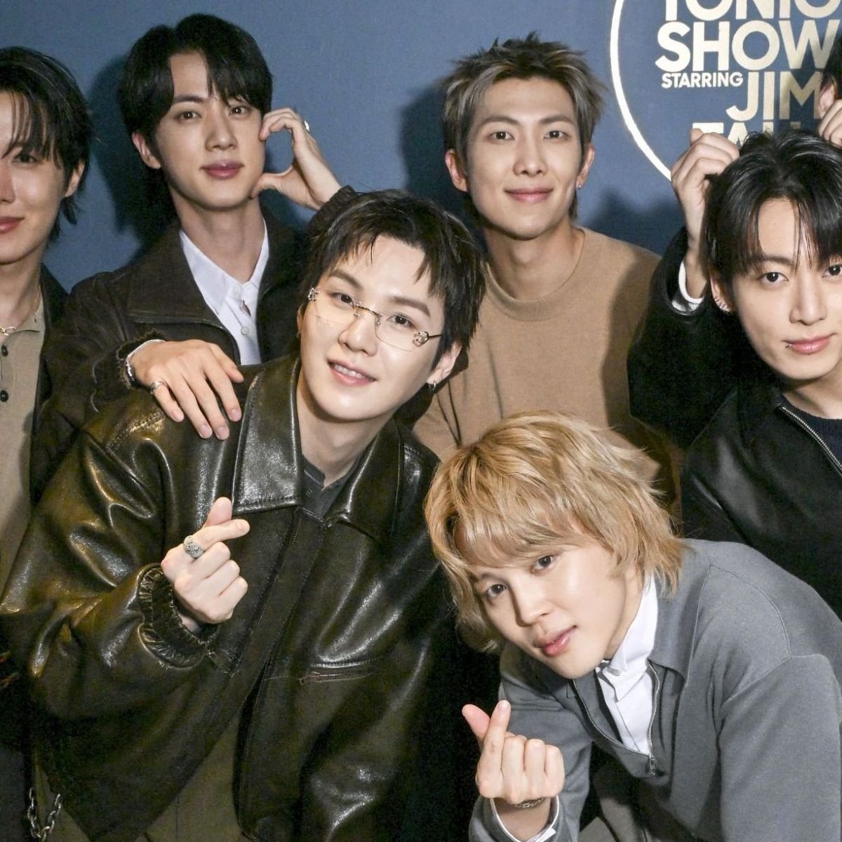 THE TONIGHT SHOW STARRING JIMMY FALLON -- Episode 2272 -- Pictured: (l-r) j-hope, Jin, Suga, Jimin (crouched), RM, Jung Kook, and V of musical guest BTS pose together backstage on Wednesday, March 25, 2026 -- (Photo by: Todd Owyoung/NBC via Getty Images)